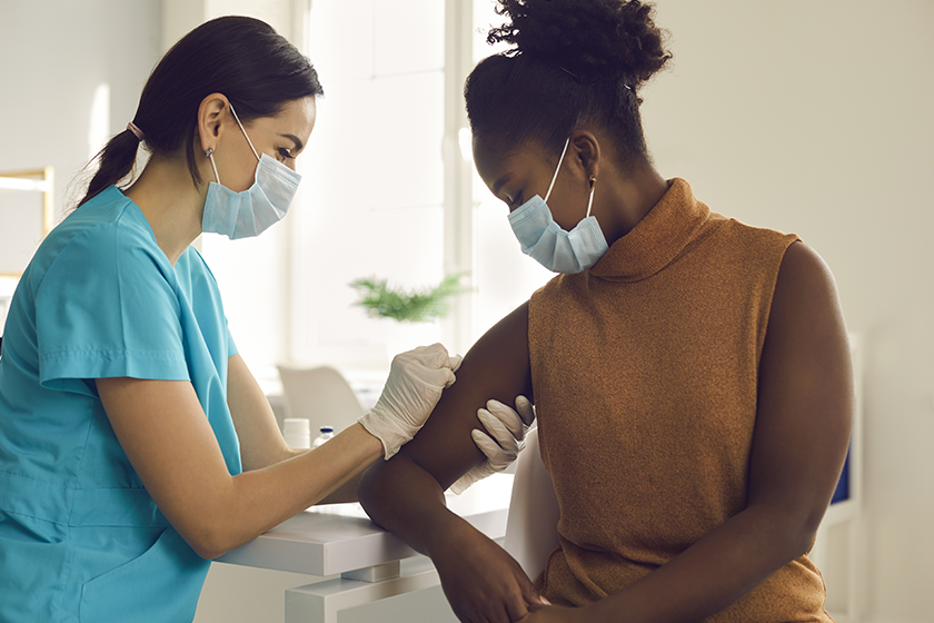 CareRev nurse with patient after vaccination