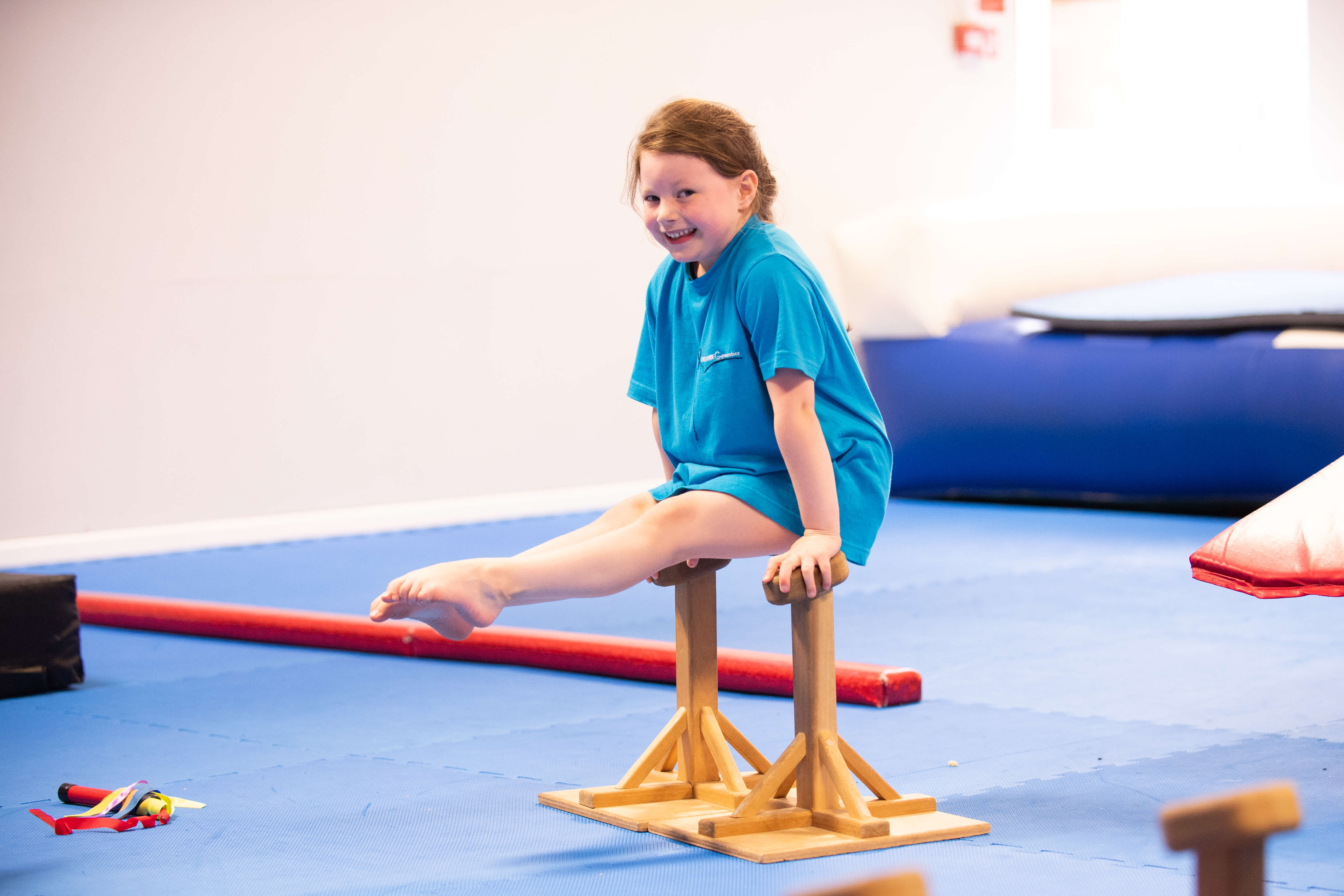 Child doing Gymnastics gymnastics session