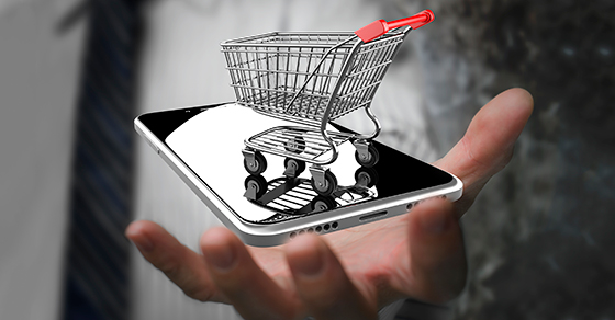 tiny shopping cart on smartphone