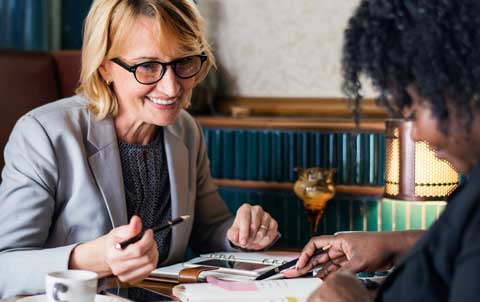 two women working on an estate plan