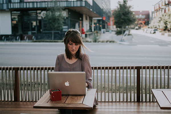 woman on laptop outside