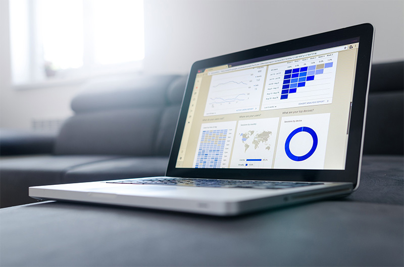 charts and graphs on laptops