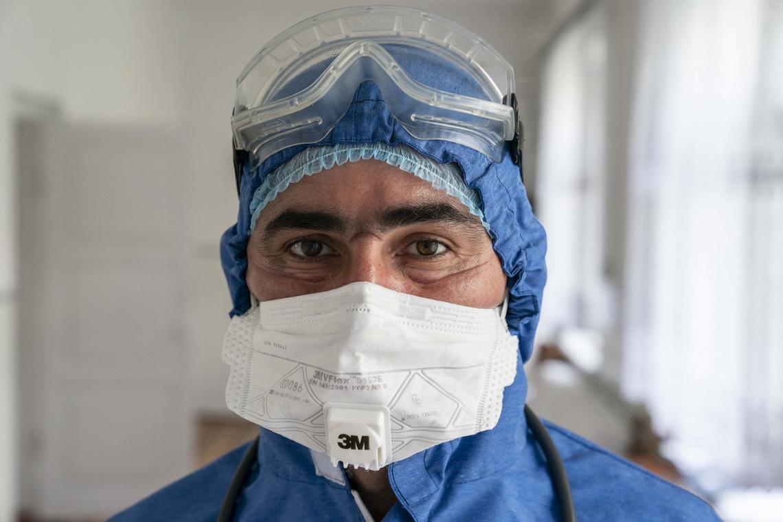 Ukraine. A doctor looks at the camera.