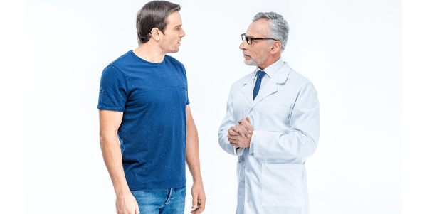 Doctor discusses BPH symptoms and treatment with his patient