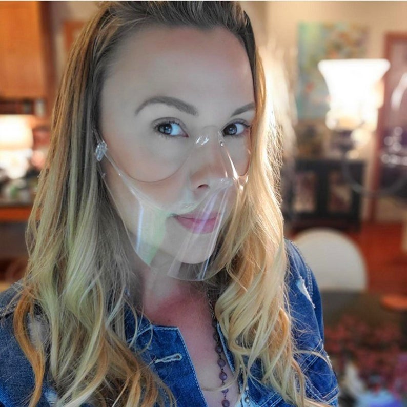 Clear face shield allows for seamless ASL communication.