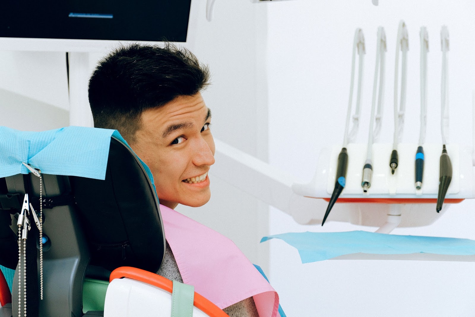 male dental patient in chair