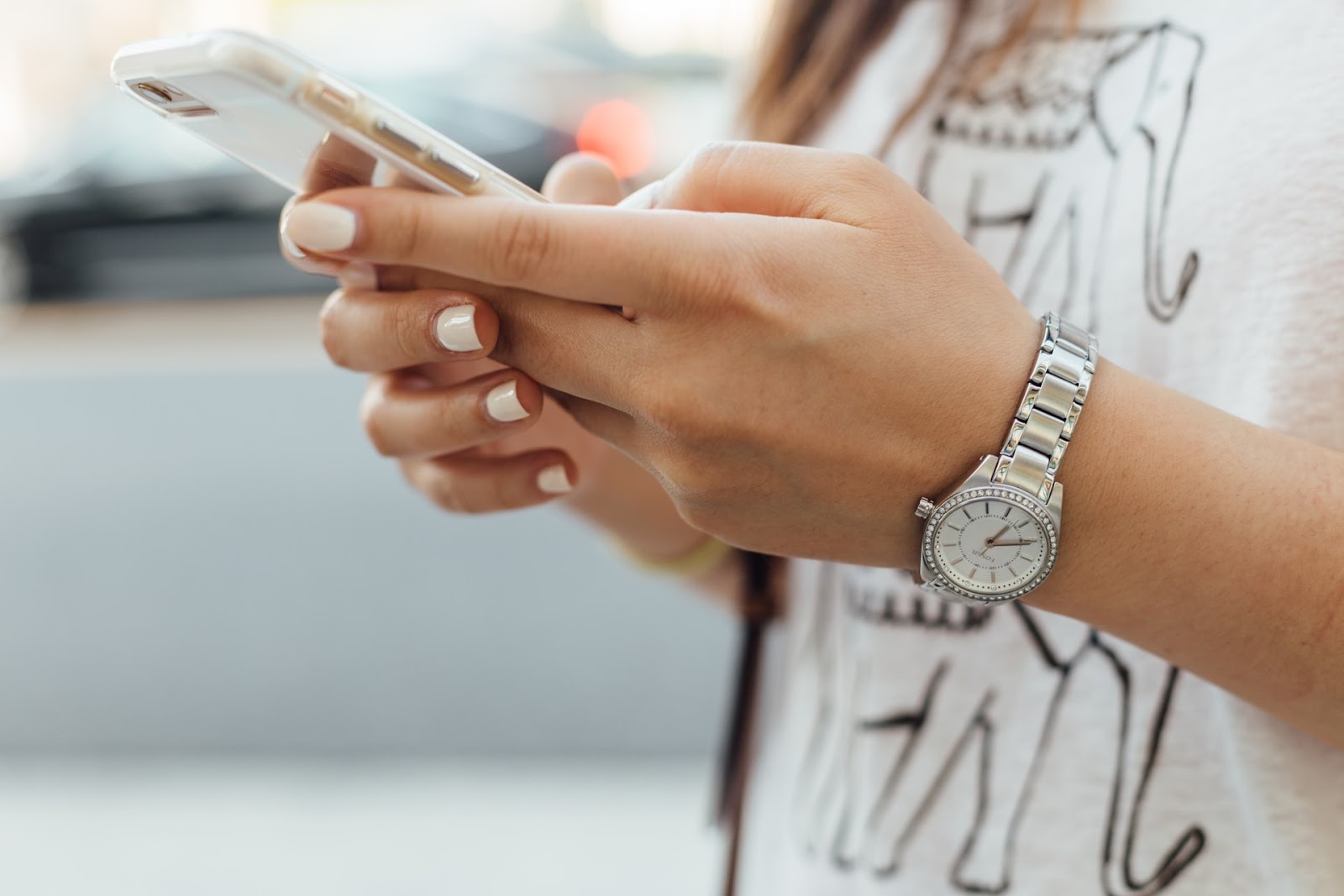 a woman using her cell phone