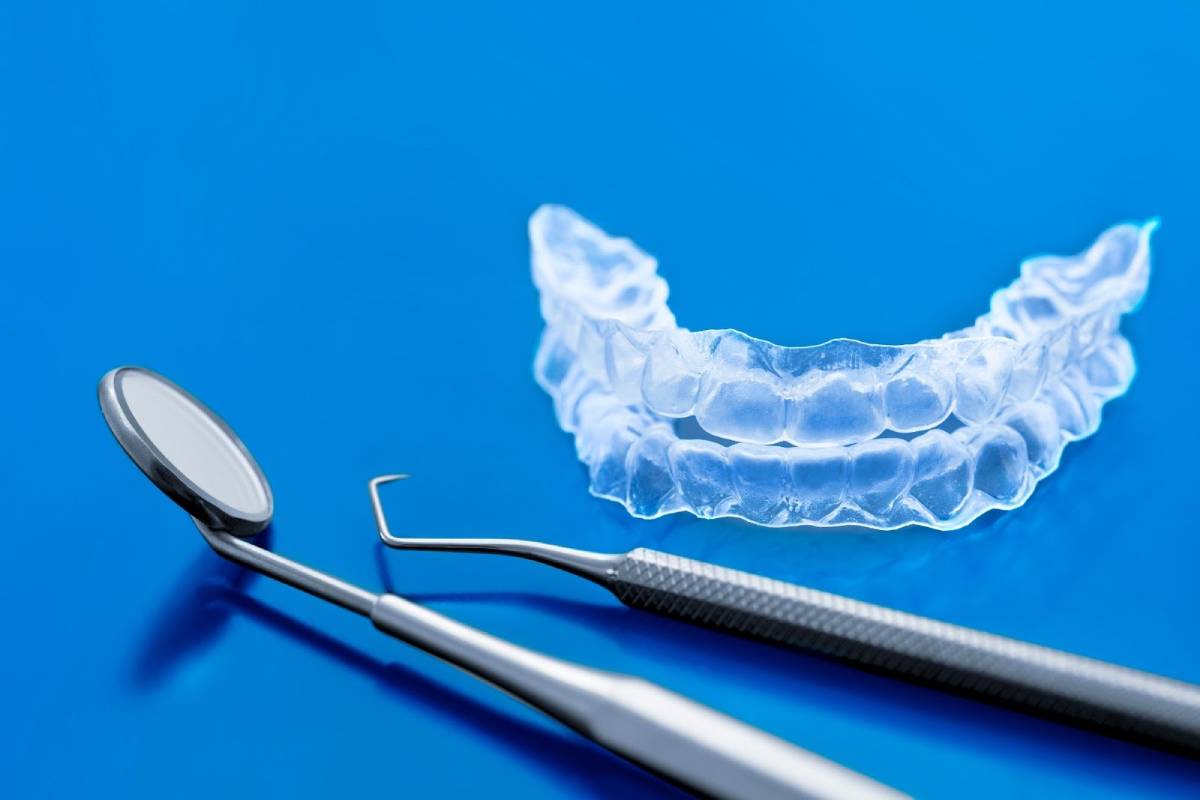 invisalign trays and dental tools