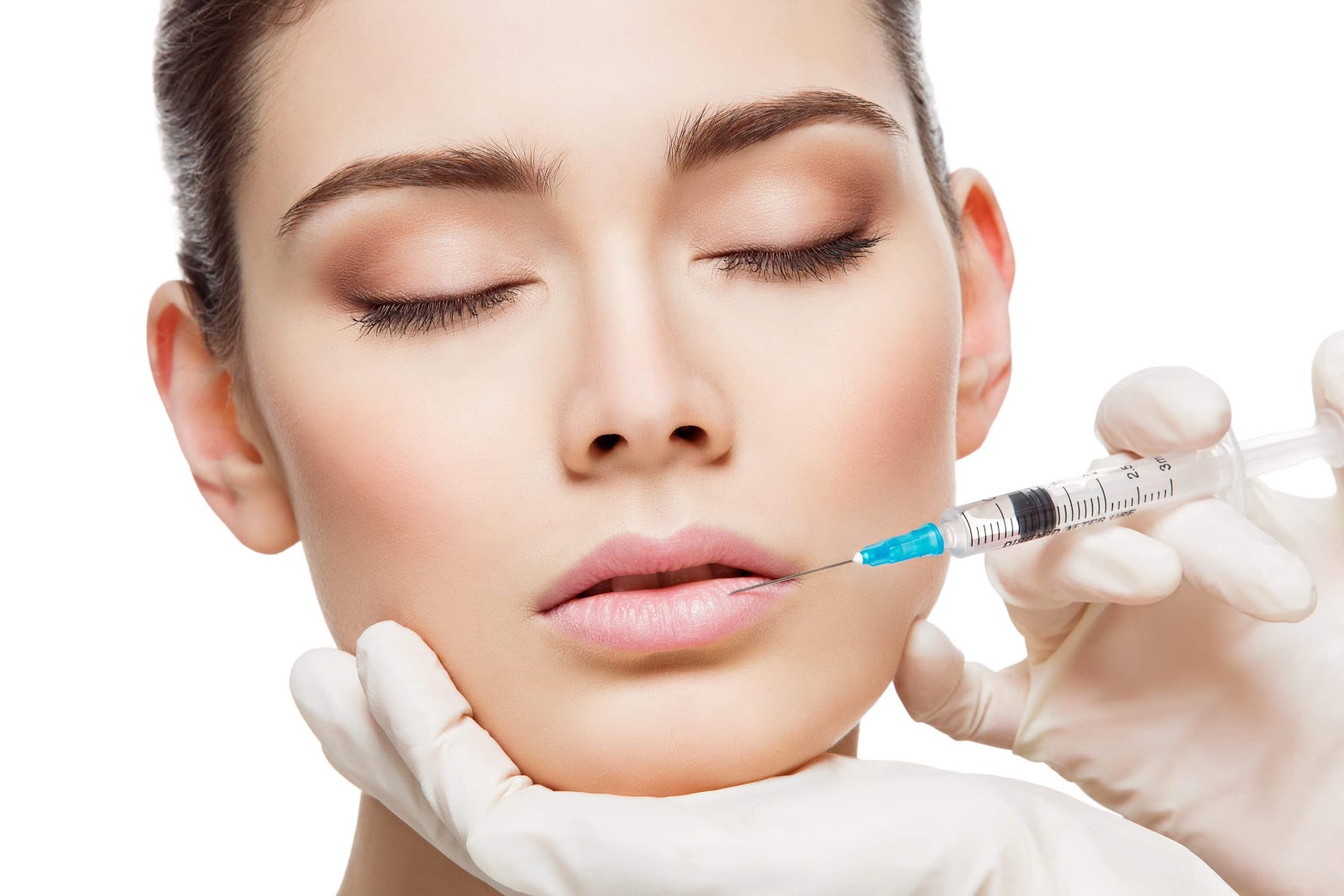 physician sticking needle into patient's lips