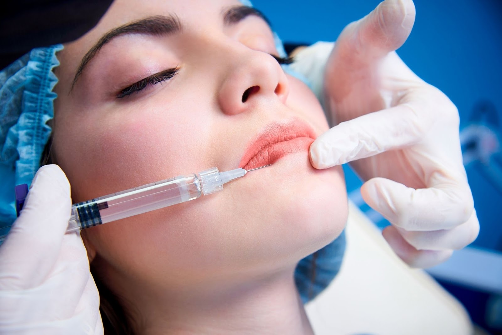 female receiving lip injections