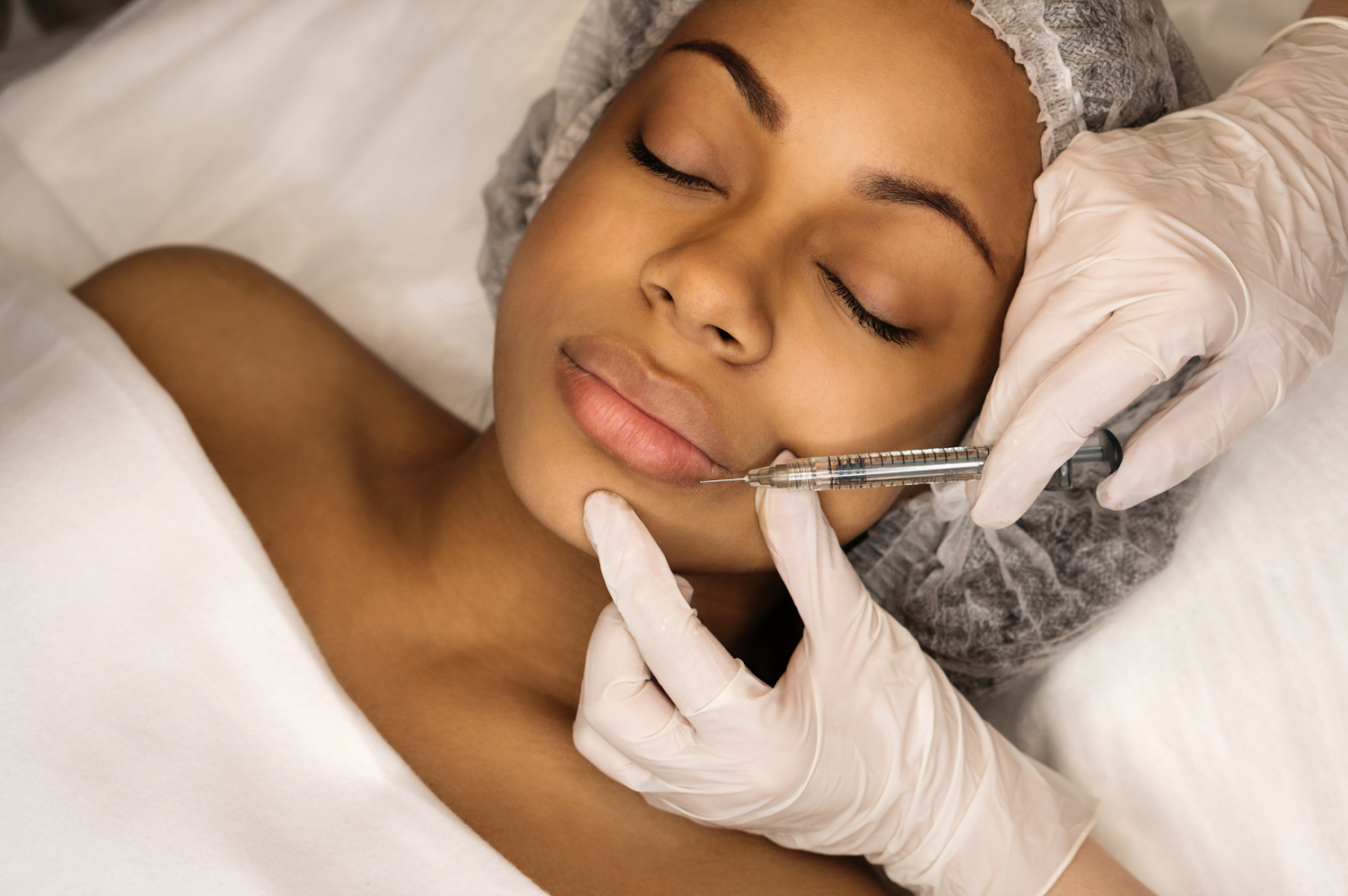 woman getting lip injections