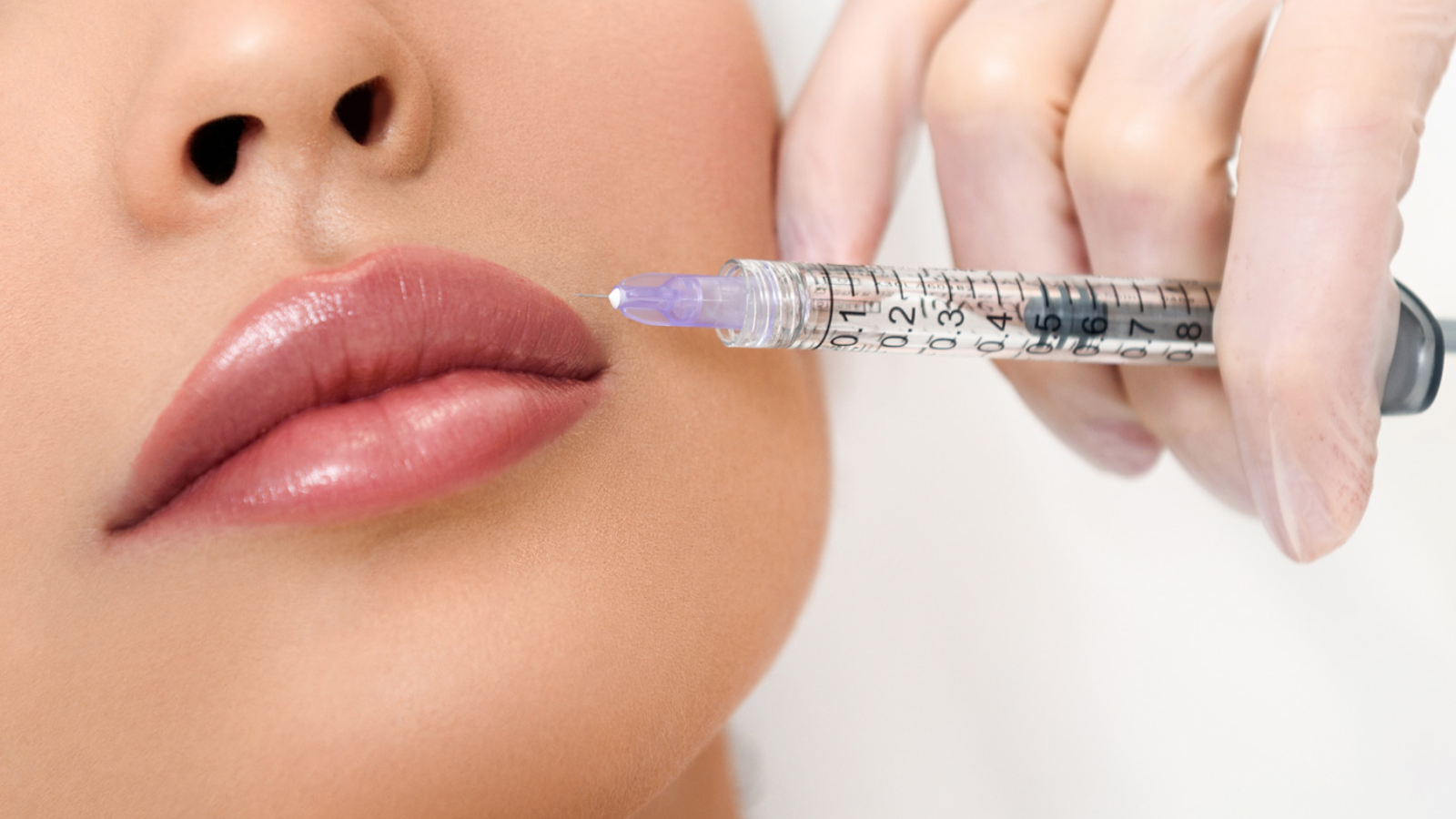 woman getting lip injections