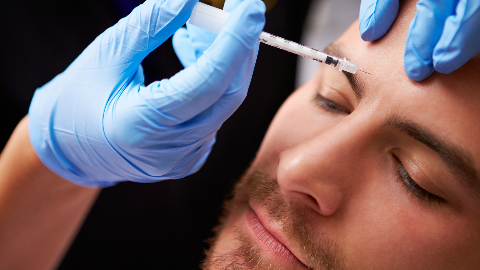closeup of man getting Botox