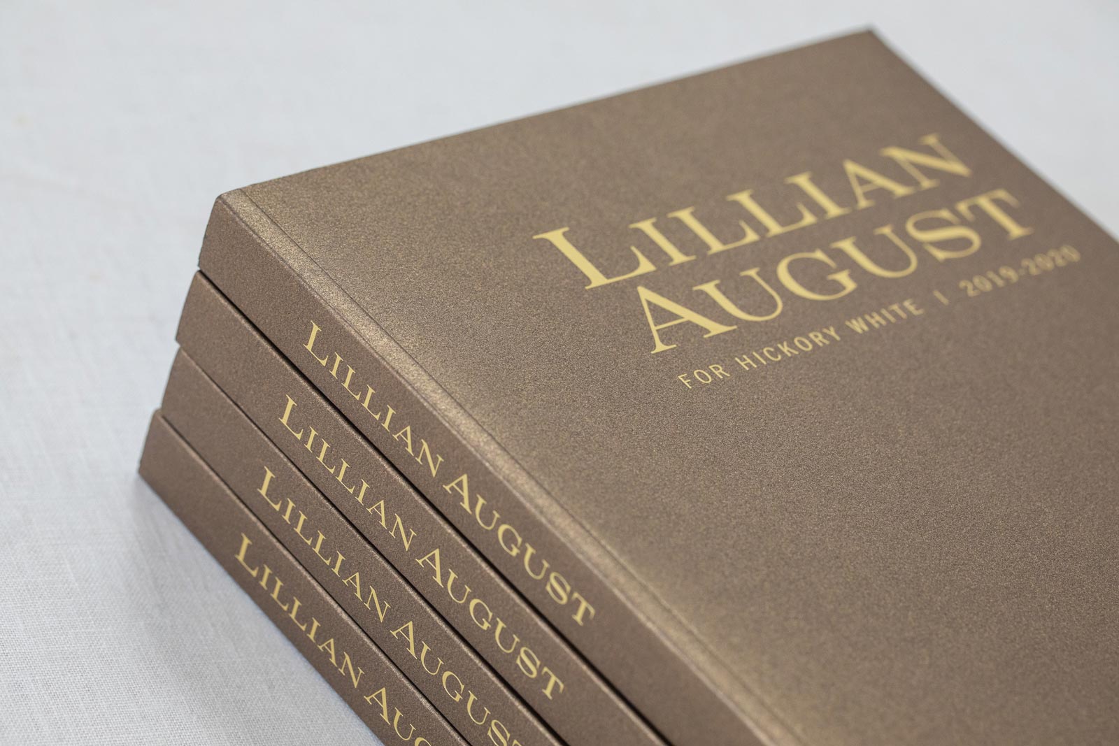 Lillian August Fine Furniture catalog cover in gold metallic paper and gold foil stamped