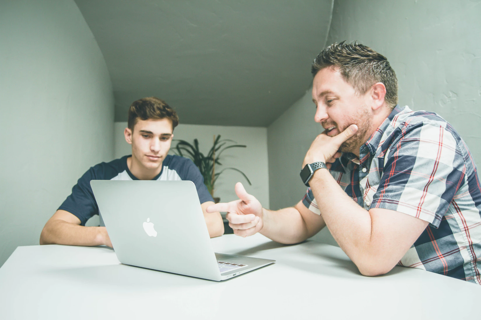 Men planning laptop