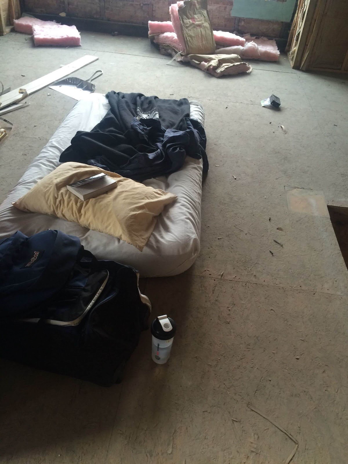 air mattress on a dirty floor