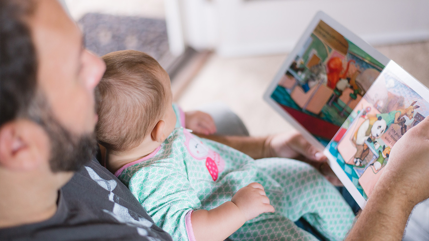 Parent reading children's book