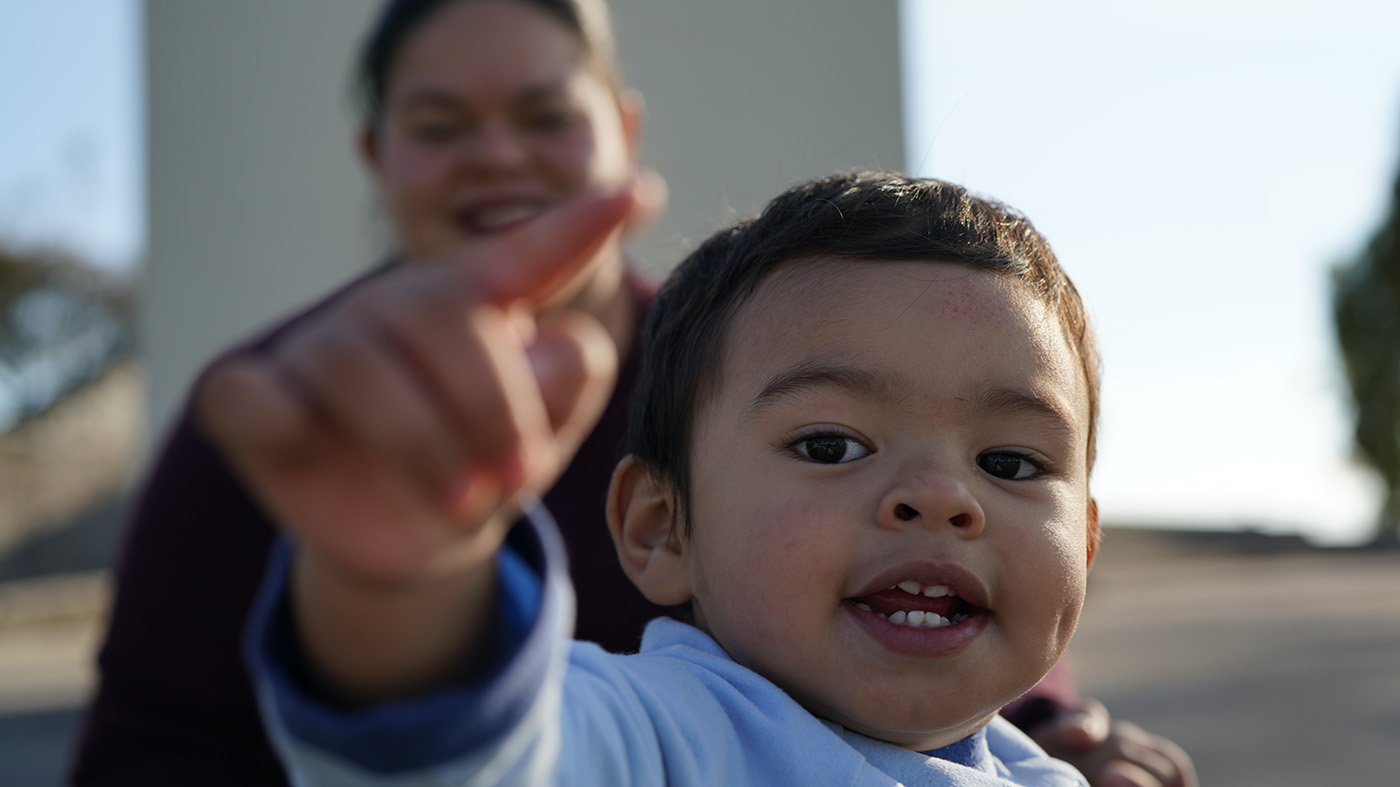 Kid playing simon says