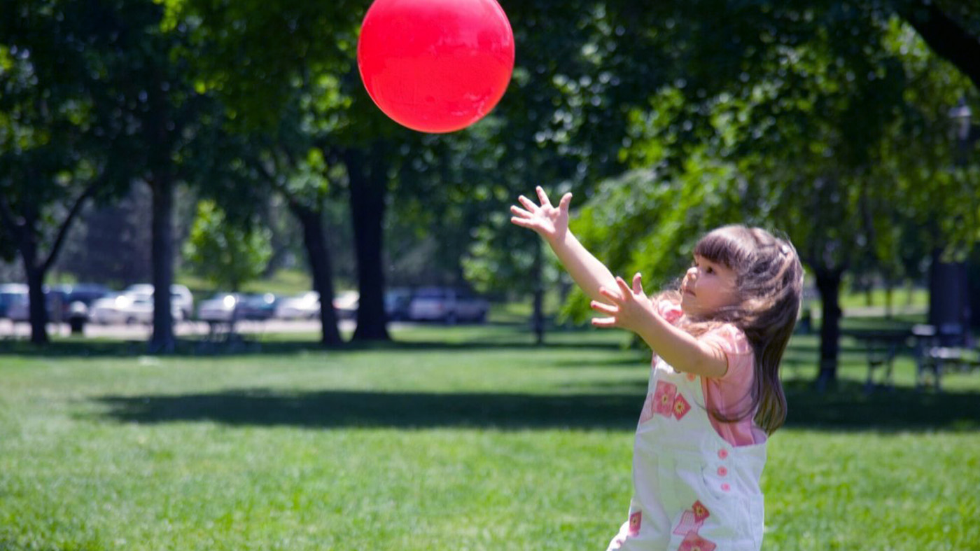 Girl catching ball