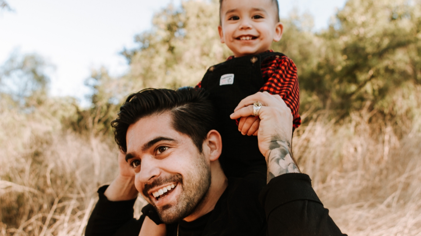 Carrying kid on shoulders