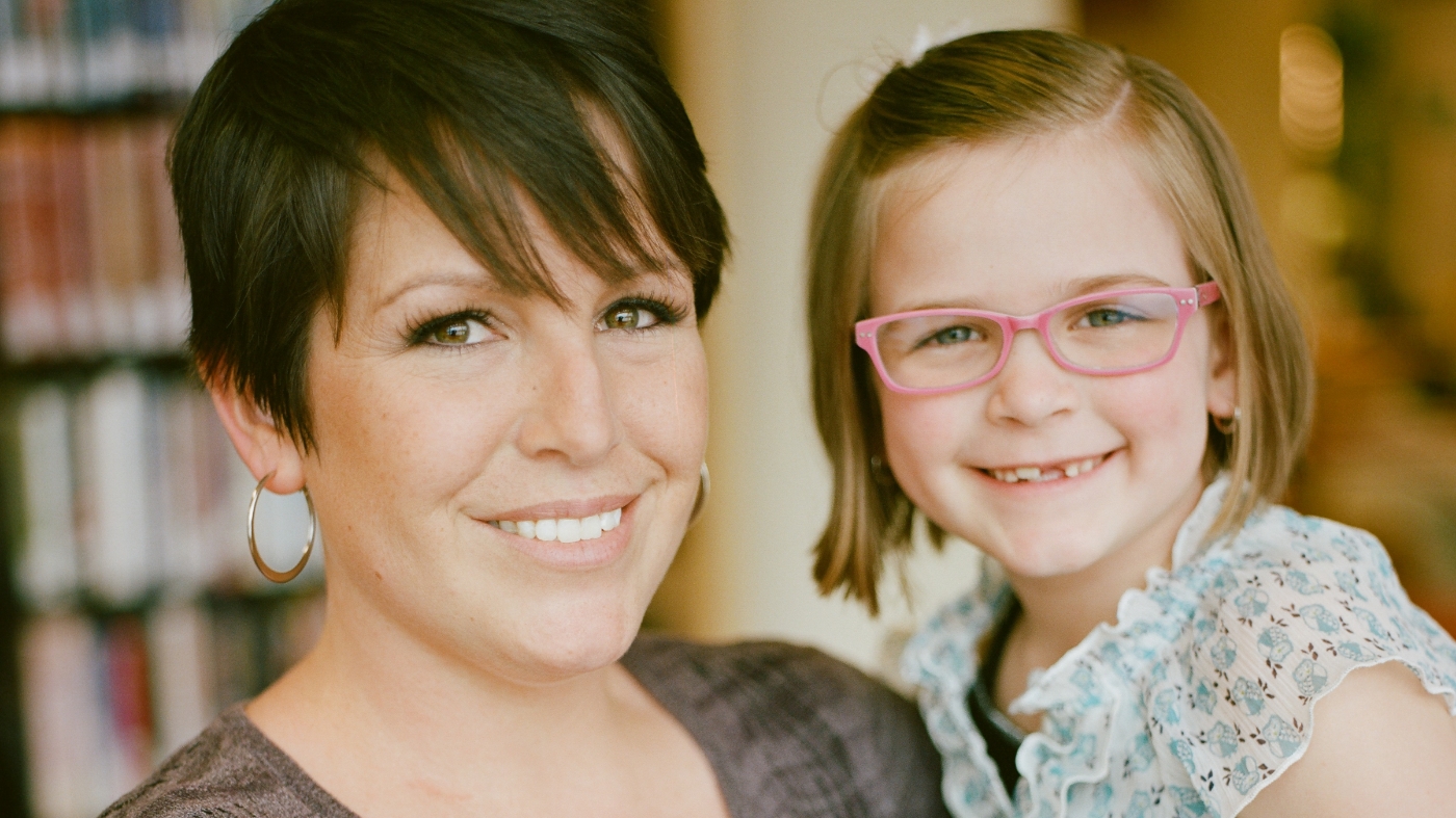 Ministry director with holding kid