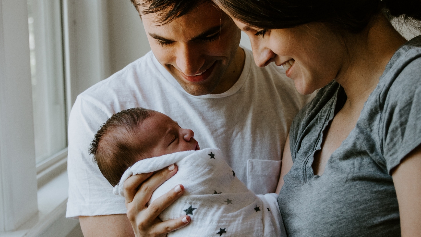 Parents holding their beloved child