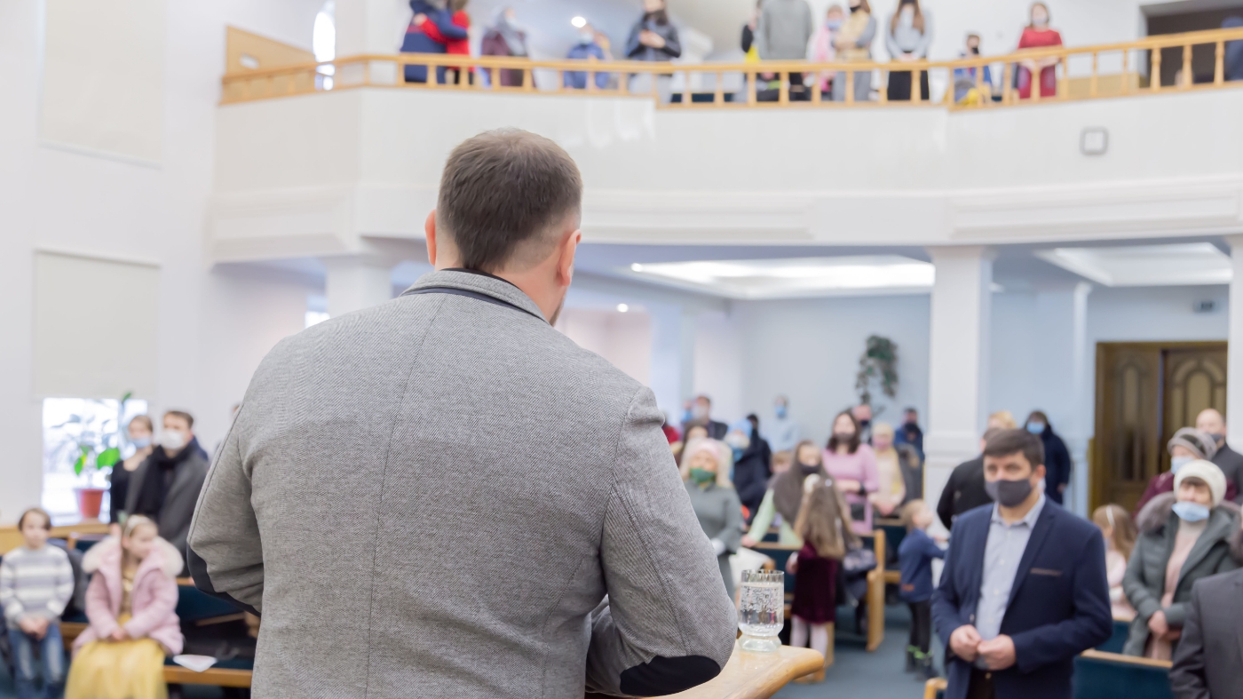Sharing testimony with the church congregation