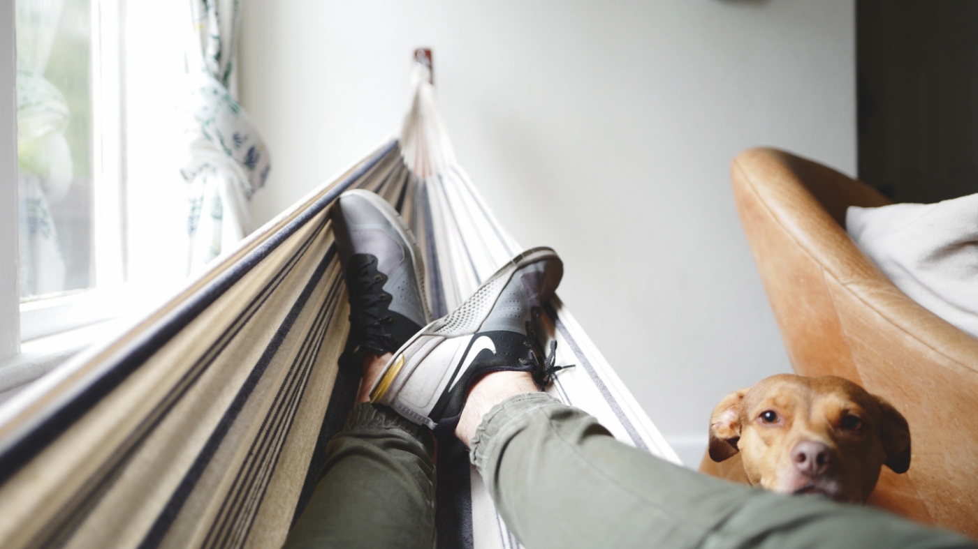 Laying inside a hammock indoors