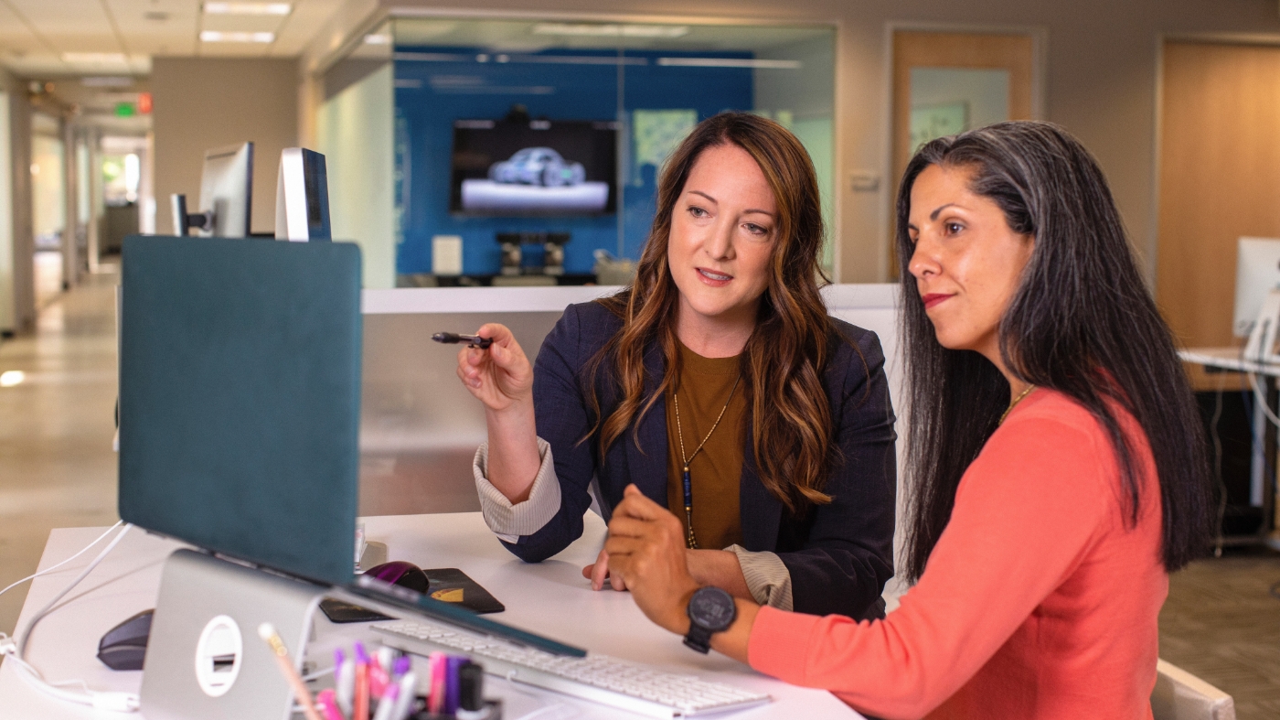 Female leader teaching others