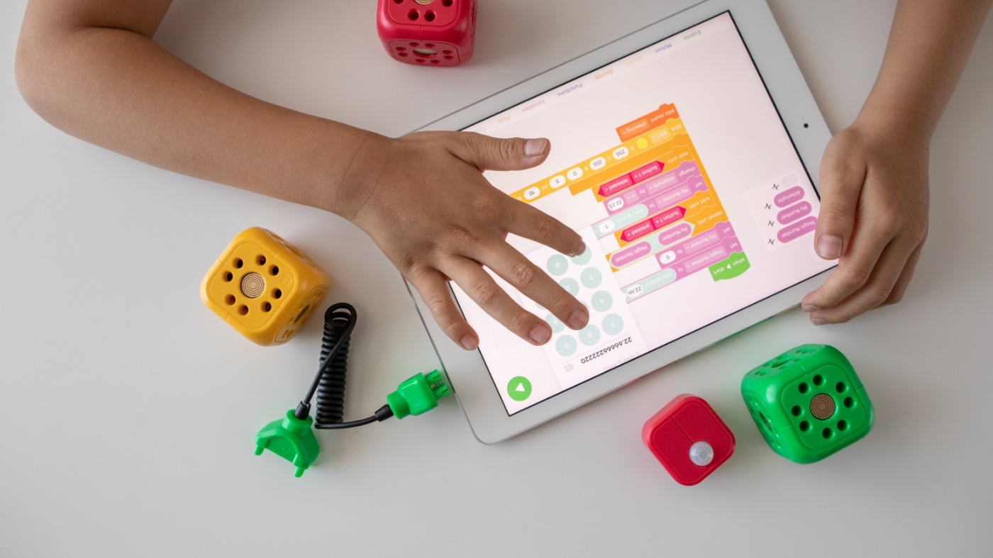 Kid using technology to learn