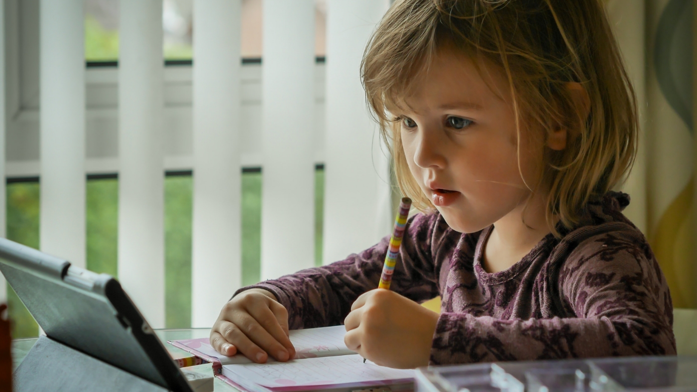 Kid learning through her ministry curriculum