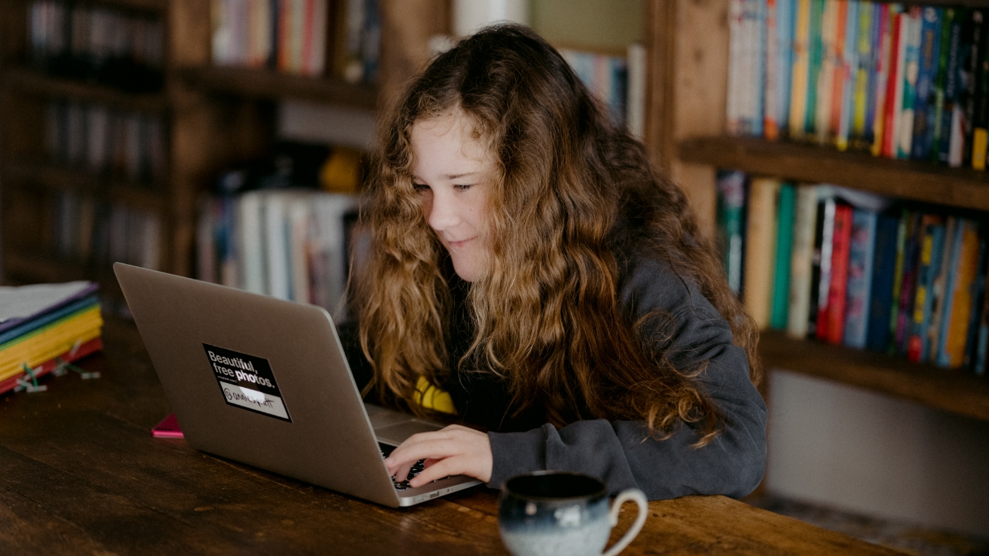 9 year old girl reading devotional