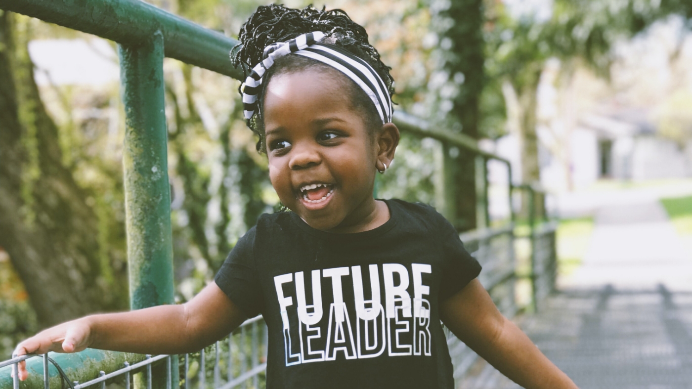 Little girl feeling empowered to be a future leader