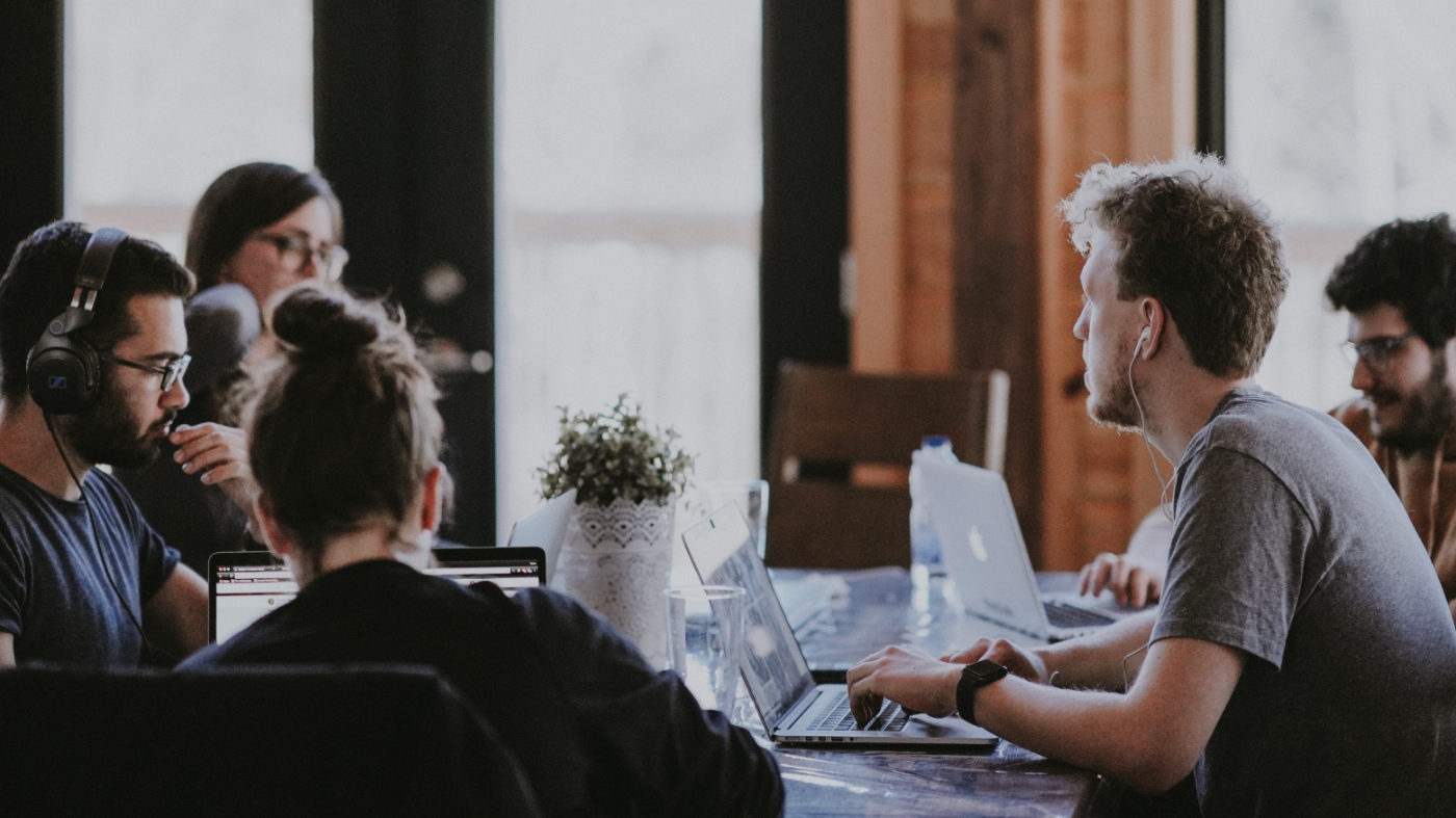Church social media team discussing how to boost content