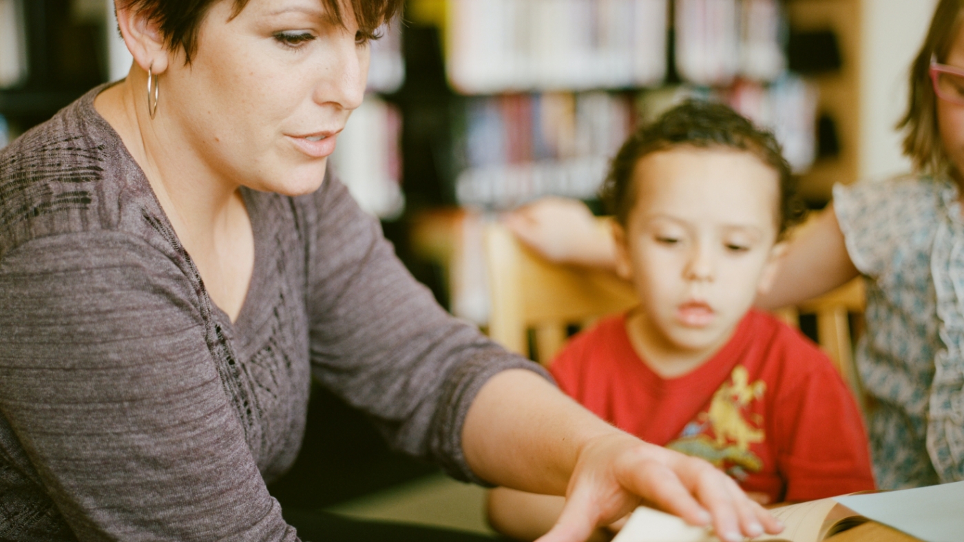 Ministry teacher reading to kids