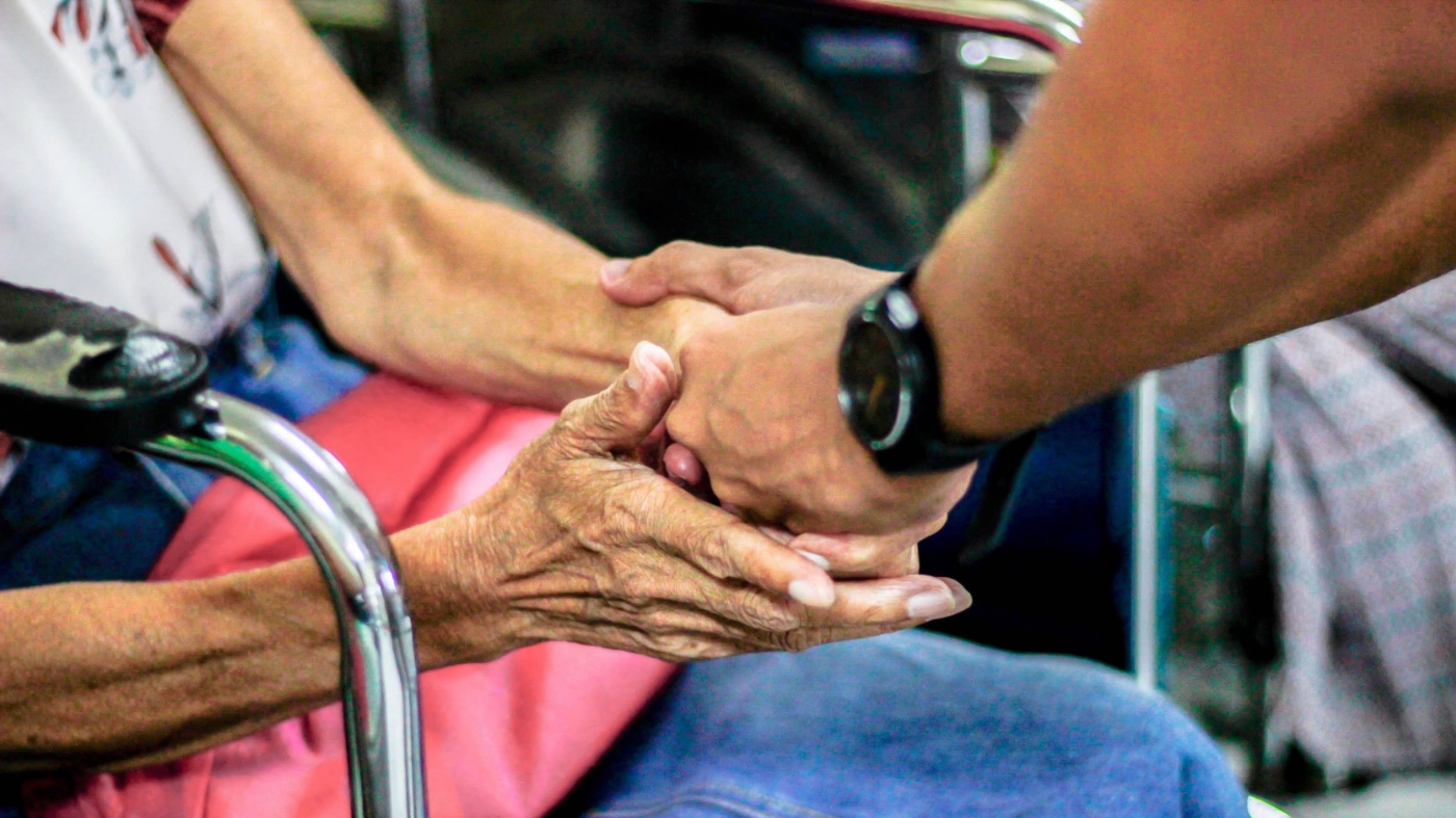Man helping community elderly