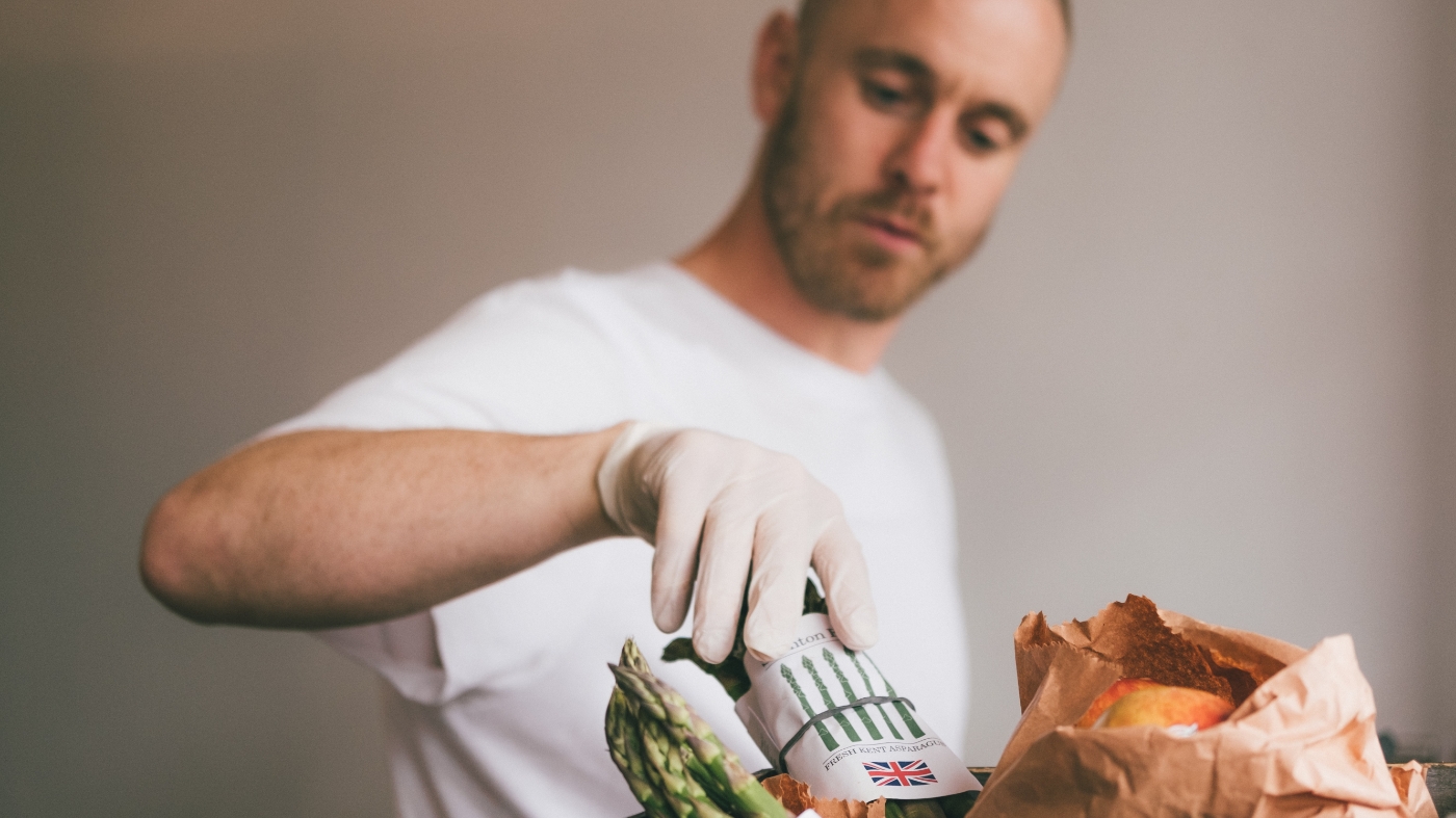 Man serving food to help others out