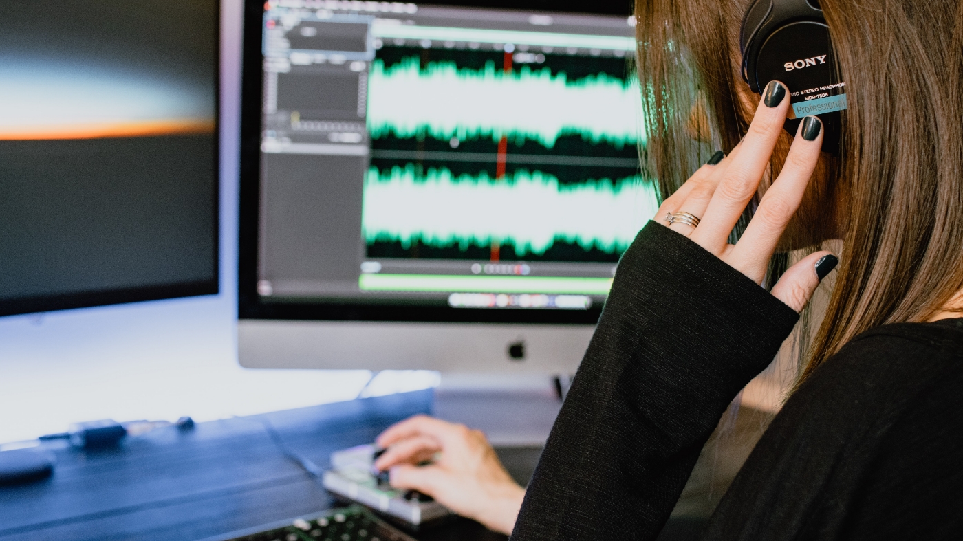 Woman creating a music soundtrack