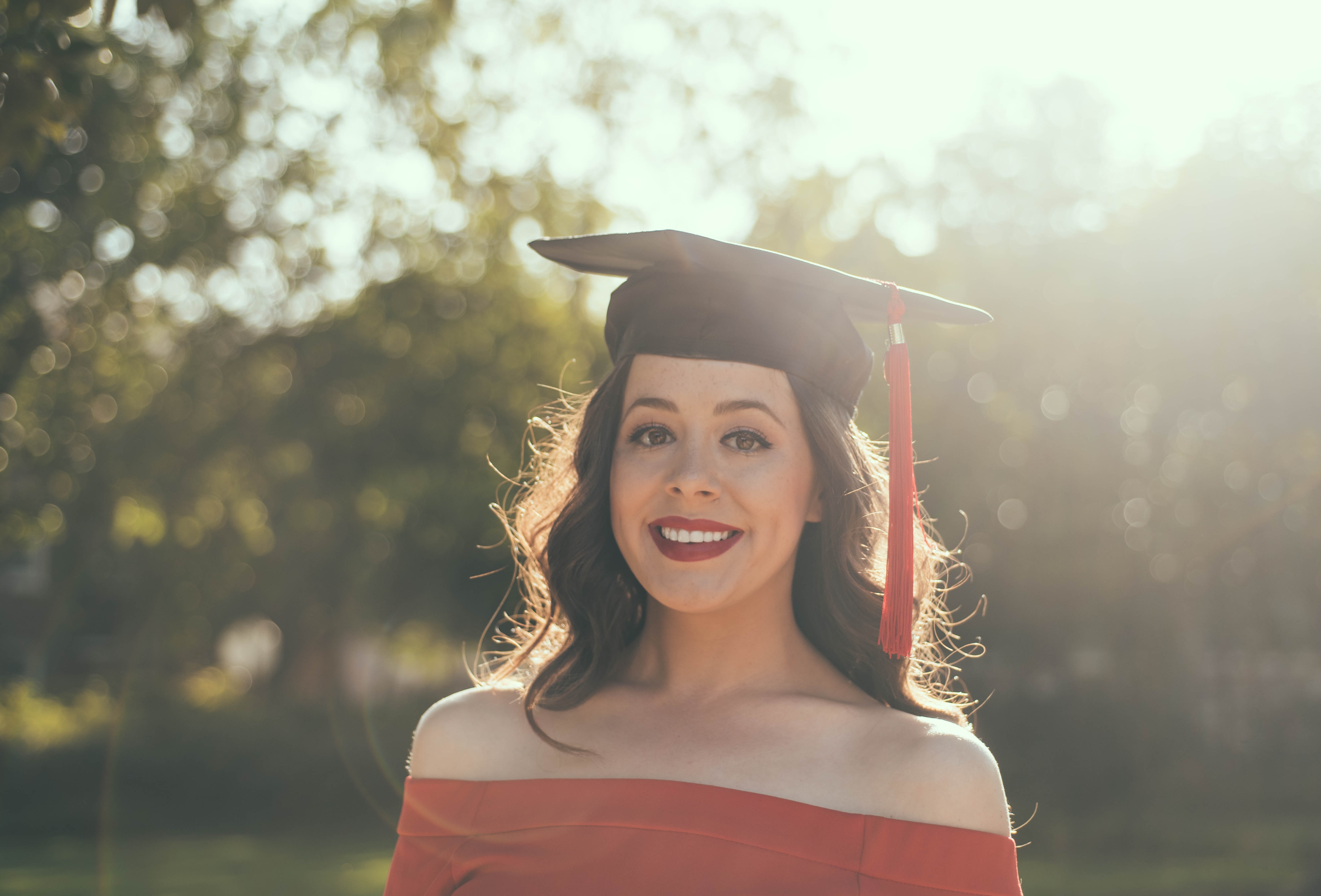 women with graduation hat