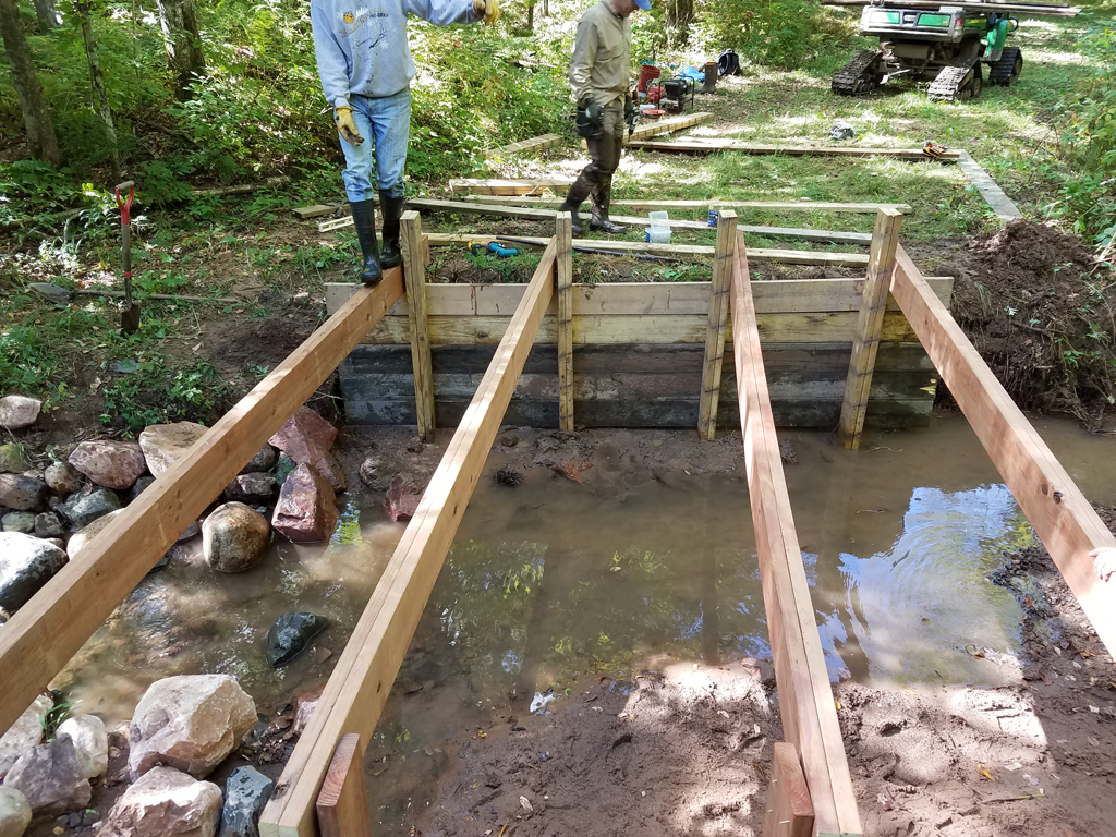summer 2016 showing initial phases of bridge repair near #25 on the Blue Hills Trail
