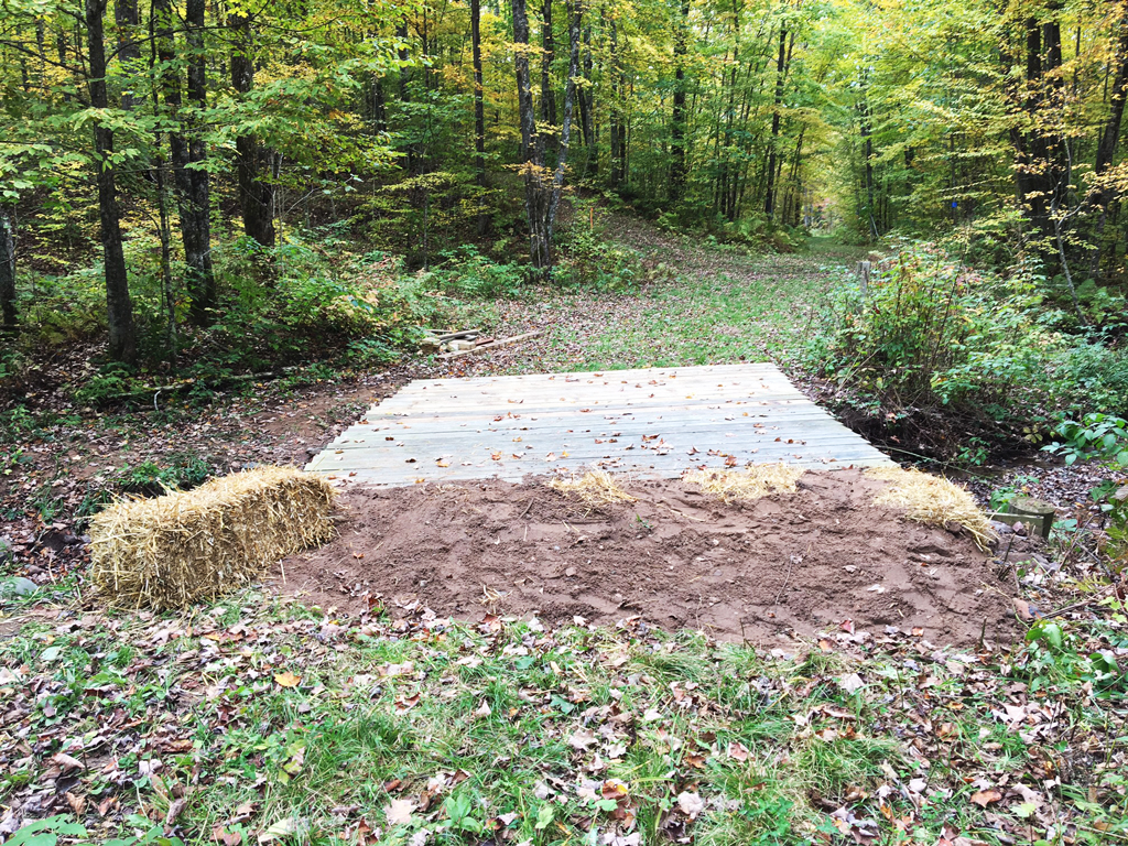 completed bridge structure with fill added on the east side of the bridge