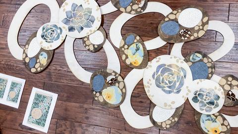 section pf photo backdrop laid out on the floor