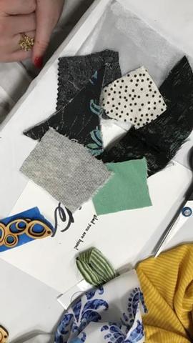 DIY workshop fabric pieces laying out on table