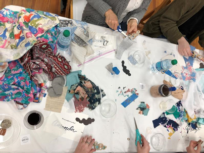image from above table with fabric pieces spread out haphazardly