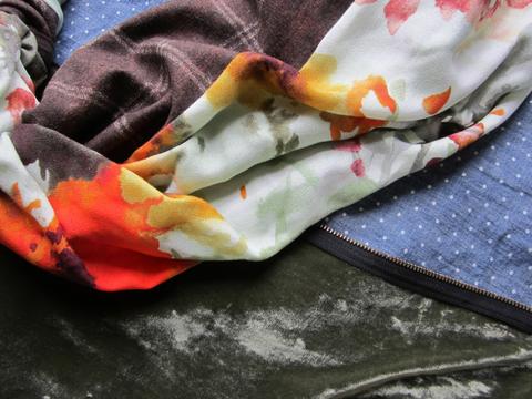 White polkadot denim, green-orange watercolor floral print, moss green velvet fabric.