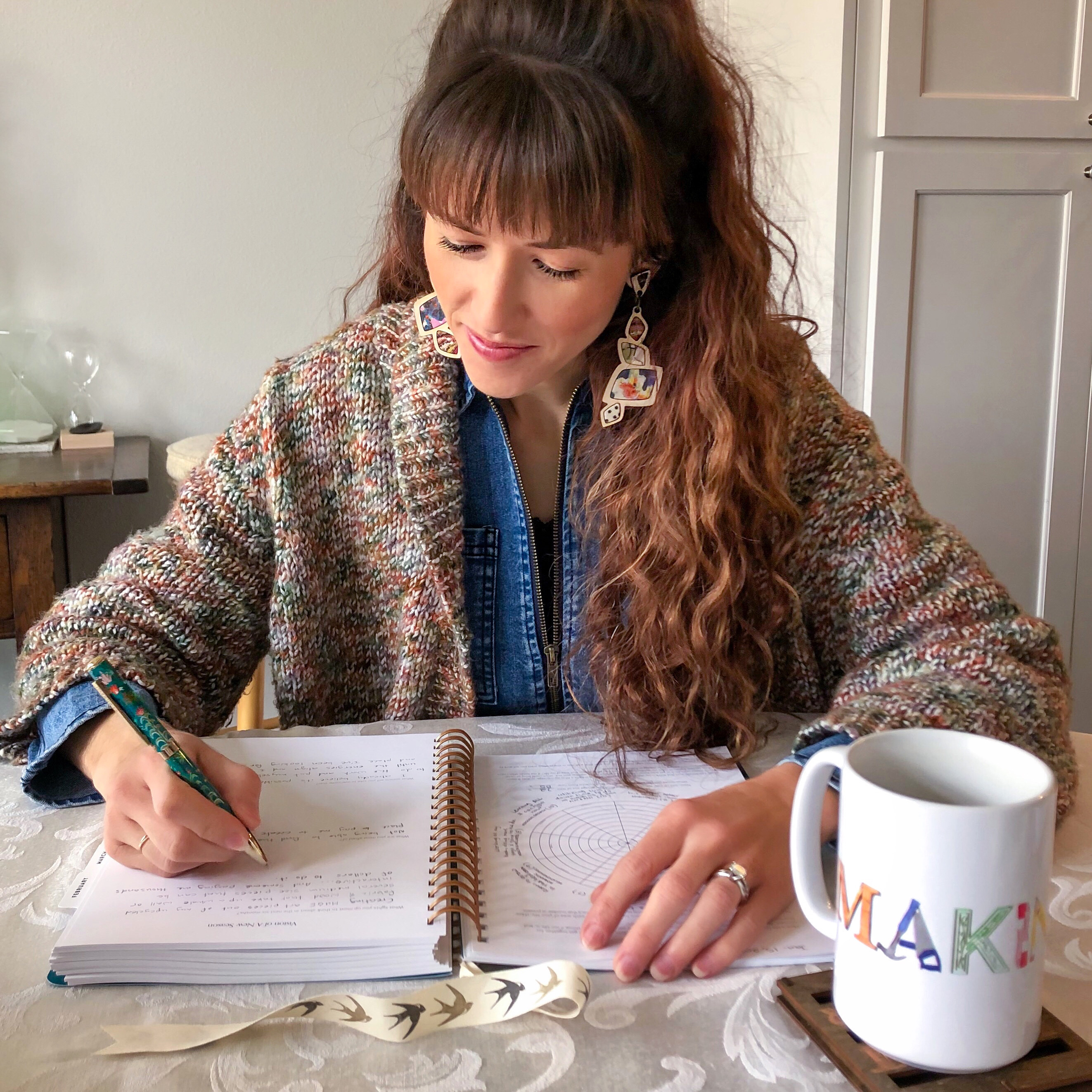 Alyssa Bird filling out her Goals Journal for 2020