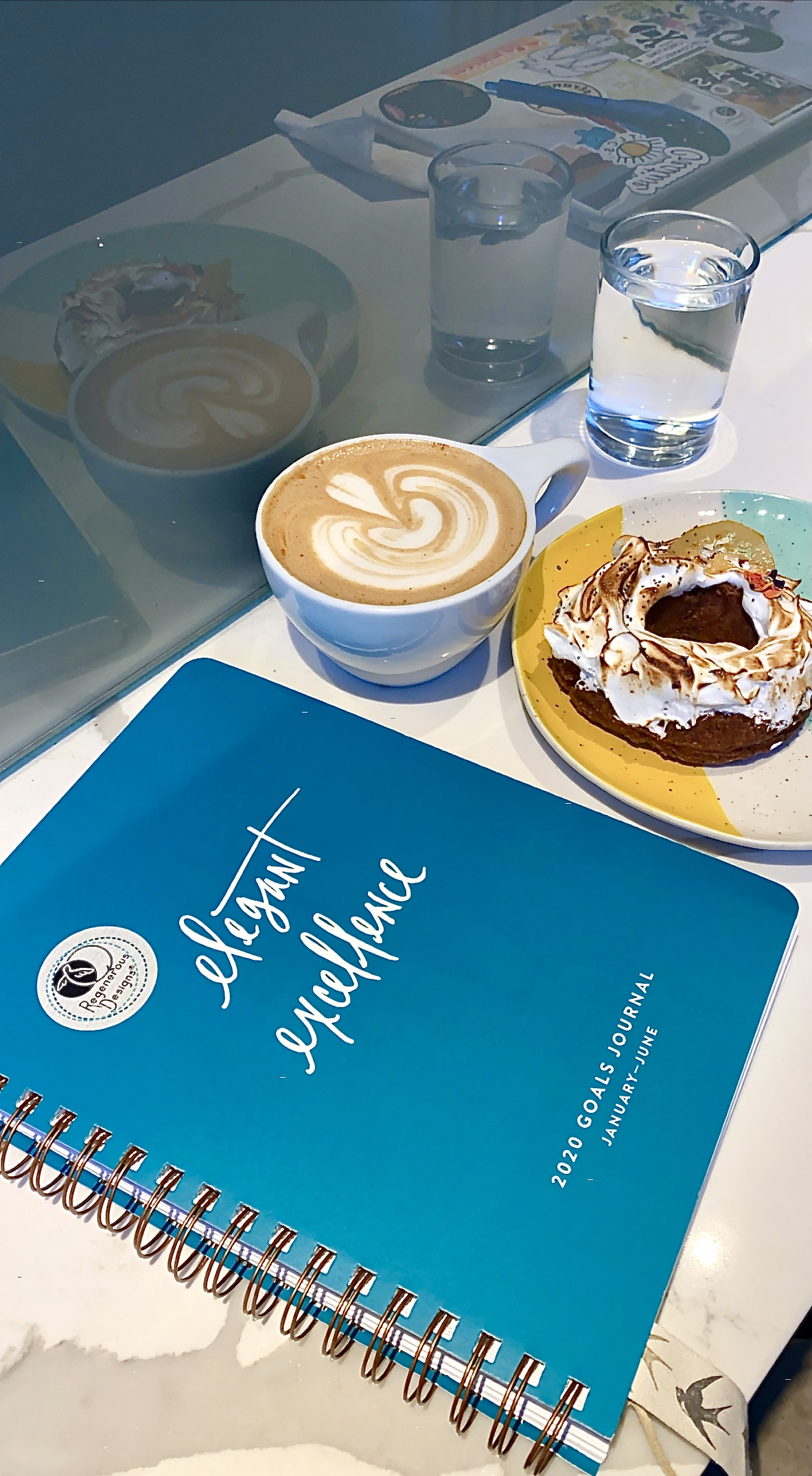 Elegant Excellence Goals Journal with a yummy coffee and donut from Onyx Coffee Lab