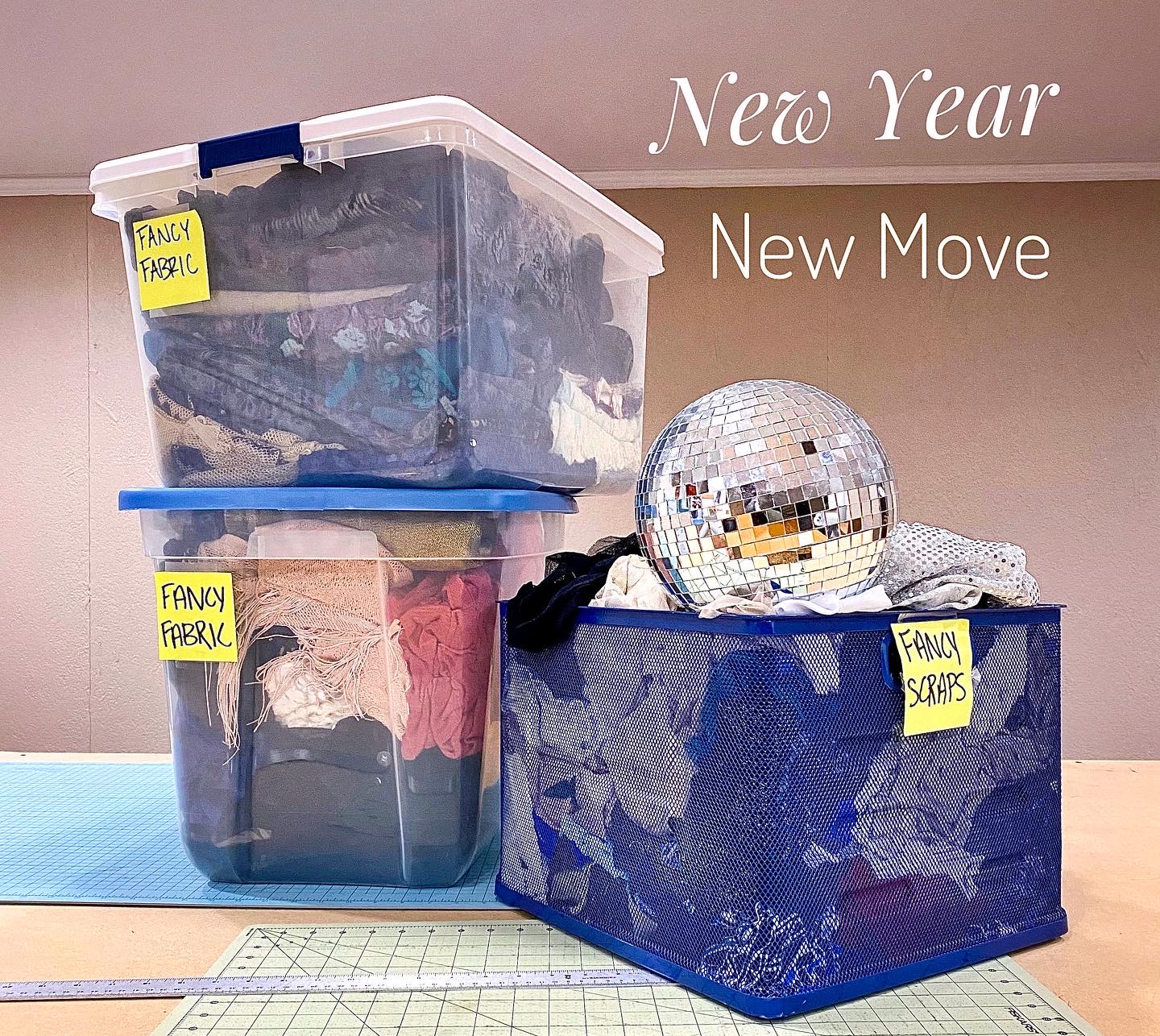 Boxes of fabric and a disco ball. New Year. New Move