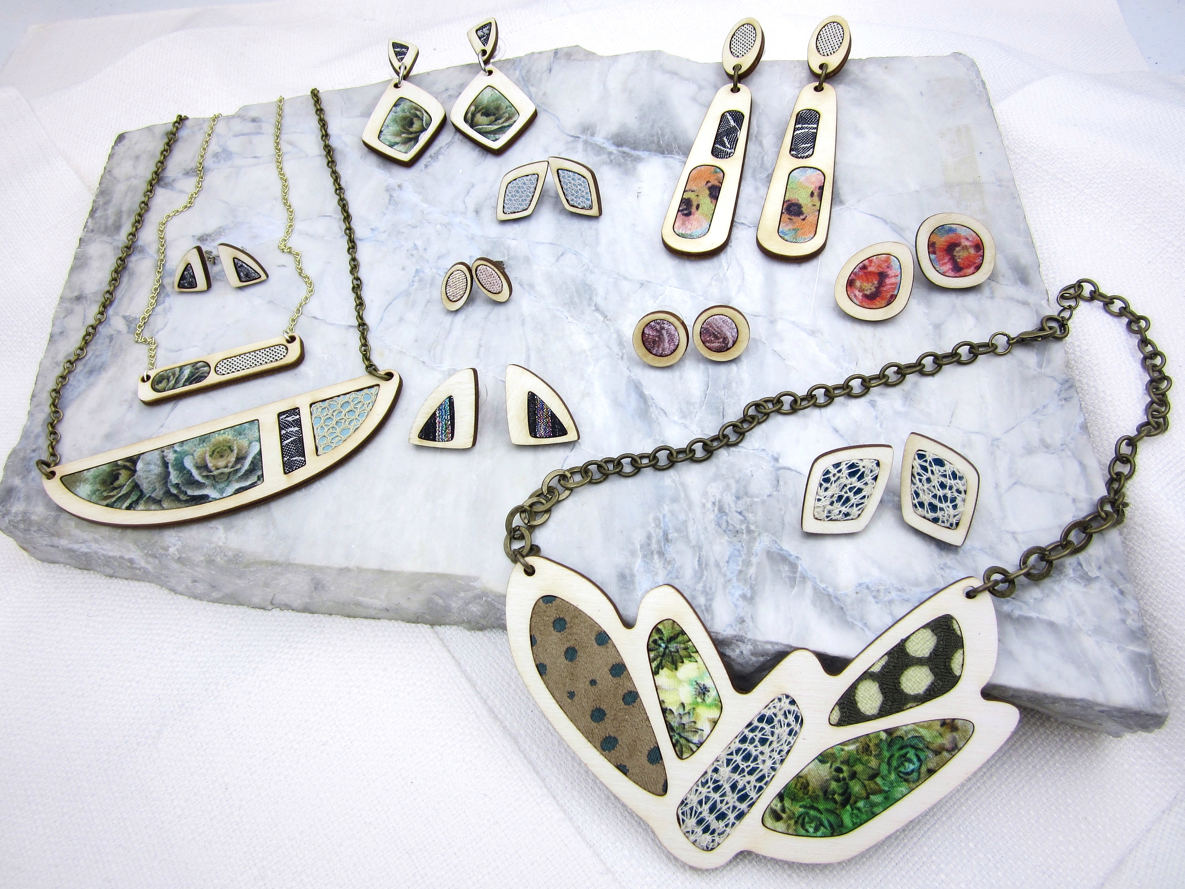 Beautiful custom collection of one of a kind textile and wood fashion accessories available at Scottdale Museum of Contemporary Arts