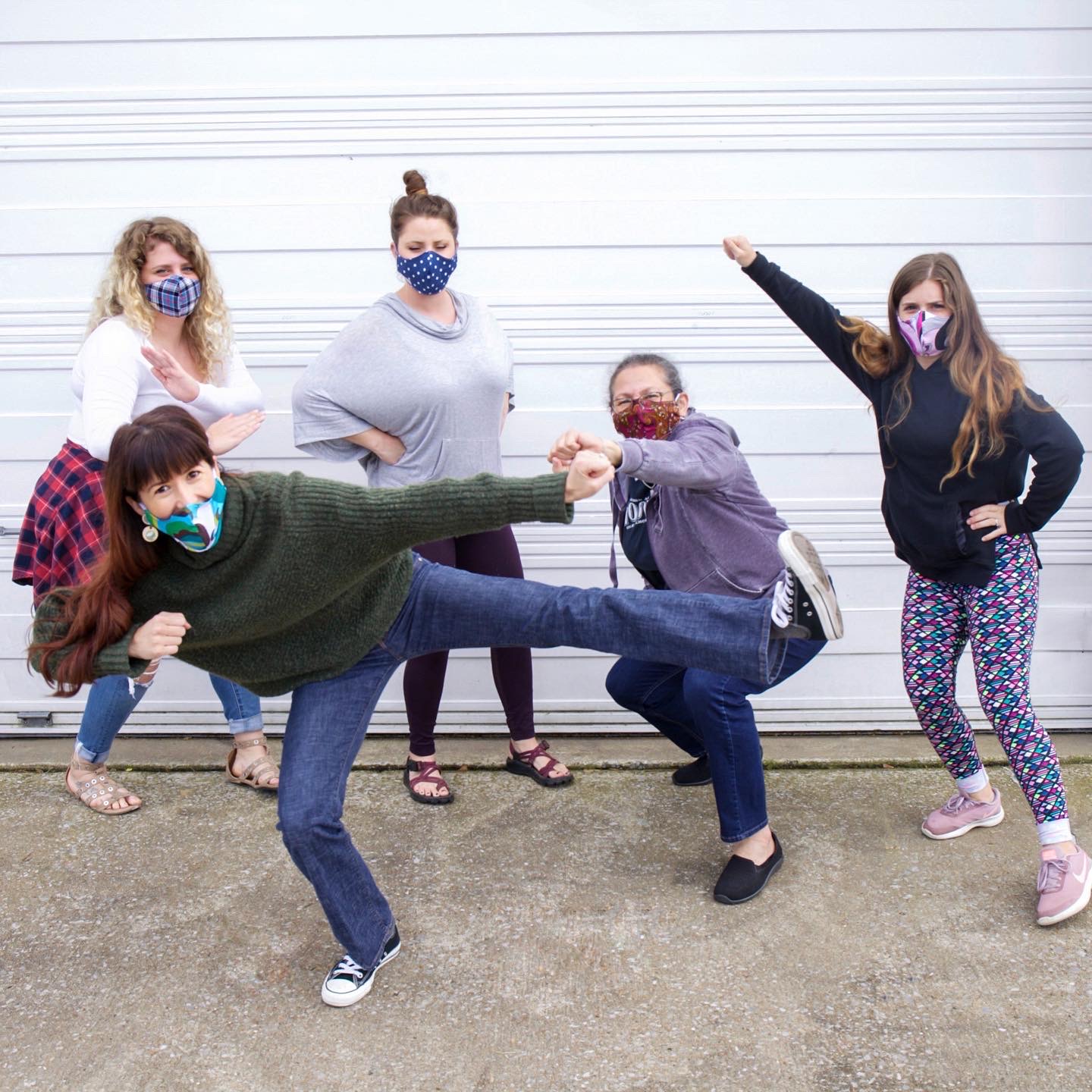 Group of ladies kickin butt and showing off their Regenerous Designs face masks they made